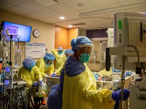 FILE PHOTO: Nurses finish proning a COVID-19 patient inside the intensive care unit of Humber River Hospital in Toronto.