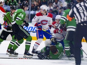 Montreal Canadiens left wing Jonathan Drouin draws a game misconduct major for a cross check on Dallas Stars center Tyler Seguin during the third period at the American Airlines Center.