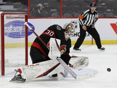 Ottawa Senators goaltender Matt Murray (30) makes a save against the Buffalo Sabres during the second period.