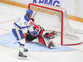 Quentin Musty (27) of the Wolves is stopped by netminder Max Donoso of the 67's during the extra-time shootout on Saturday. Ottawa's 5-4 victory was Donoso's first in the Ontario Hockey League.