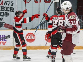 67's forward Vinzenz Rohrer celebrates after tipping a shot into the net for a power-play goal against the Petes on Friday night.