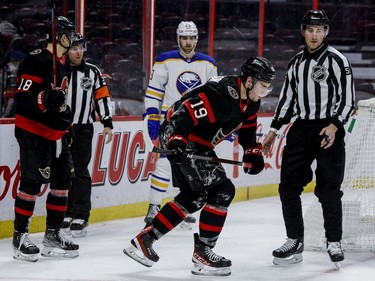 Ottawa Senators right wing Drake Batherson (19) limps off the ice against the Buffalo Sabres during the first period at the Canadian Tire Centre on Tuesday, Jan. 25,2022.