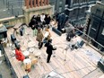 The Beatles are pictured on top of Apple Corps’ headquarters in London in 1969.