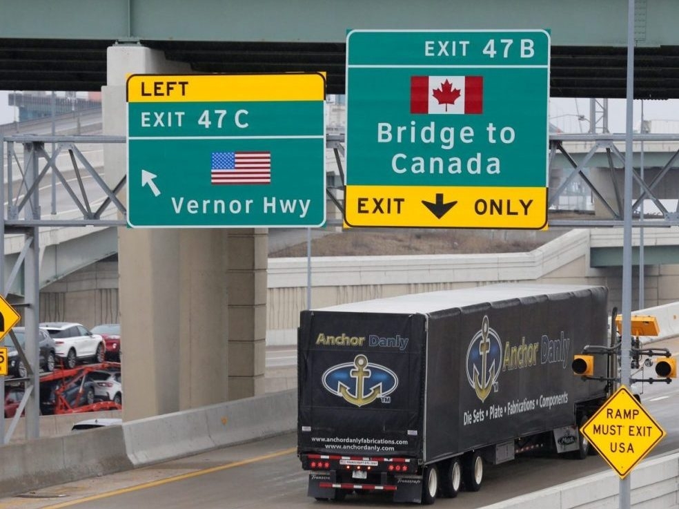 A commercial truck heads for the Ambassador Bridge during the COVID-19 coronavirus outbreak, at the international border crossing, which connects with Windsor, Ont., in Detroit, March 18, 2020.
