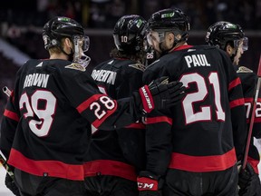 Ottawa Senators winger Connor Brown (28) congratulates teammate Nick Paul (21) on his goal against the Devils.