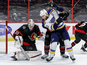 Senators goaltender Matt Murray makes a save during the second period of Tuesday's game against the Blues. He was injured after a collision with a Blues player in the third period.