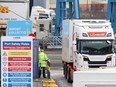 A truck leaves Larne port, north of Belfast in Northern Ireland, after arriving on a ferry from Stranraer in Scotland, Feb. 3, 2022.