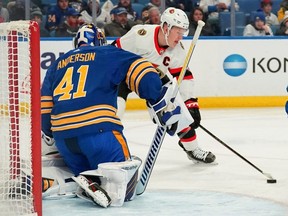 BUFFALO, NY - FEBRUARY 17: Craig Anderson #41 of the Buffalo Sabres makes the save against Brady Tkachuk #7 of the Ottawa Senators during the second period at KeyBank Center on February 17, 2022 in Buffalo, New York. (Photo by Kevin Hoffman/Getty Images)