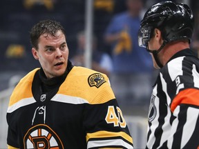 Tuukka Rask of the Boston Bruins talks to the referee in the second period in Game 3 of the First Round of the 2021 Stanley Cup Playoffs against the Washington Capitals at TD Garden on May 19, 2021 in Boston.