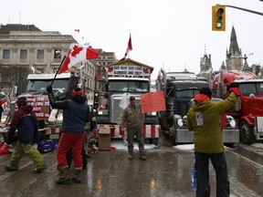 Protesters from the "Freedom Convoy" in front of Parliament Hill during a demonstration in Ottawa on Thursday, Feb. 3, 2022.