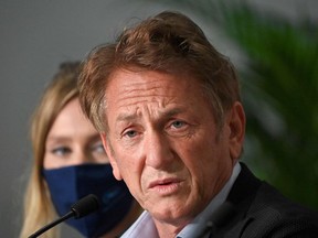 In this file photo taken on July 11, 2021 US actor and director Sean Penn speaks during a press conference for the film "Flag Day" at the 74th edition of the Cannes Film Festival in Cannes, southern France