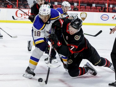 Ottawa Senators left wing Brady Tkachuk (7) battles St. Louis Blues centre Robert Thomas in the third period.