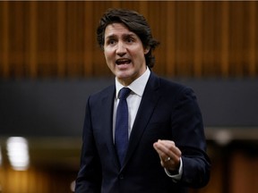 Prime Minister Justin Trudeau speaks about the trucker protest during an emergency debate in the House of Commons on Parliament Hill on Feb. 7, 2022.