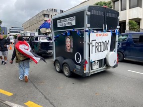 A vehicle with a picture of New Zealand's Prime Minister Jacinda Ardern is seen as Anti-vaccine mandate protesters gather to demonstrate in front of the parliament in Wellington, New Zealand, February 10, 2022.