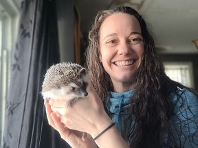 Becky Baxter with the African pygmy hedgehog she found in the snow near Carleton Place on Feb. 21.