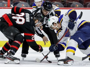 The Ottawa Senators' Connor Brown (28) faces off against St. Louis Blues centre Robert Thomas (18) during the second period.