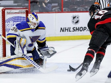 Tim Stuetzle scores a power-play goal on St. Louis Blues goaltender Ville Husso during the first period at the Canadian Tire Centre on Tuesday, Feb. 15,2022.