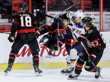 Ottawa Senators left wing Zach Sanford (13) is upended during the first period.