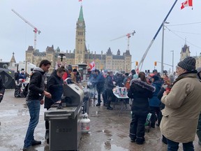 Scenes of the protest as it continues downtown on Wellington Street in front of Parliament Hill.