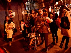 Mothers fleeing with their children from Ukraine stand at Nyugati station, after Russia launched a massive military operation against Ukraine, in Budapest, Hungary, on Feb. 27, 2022.