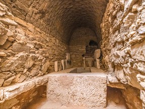 This picture taken on March 19, 2022, shows the interior of one of the five ancient Pharaonic tombs recently discovered at the Saqqara archaeological site, south of the Egyptian capital Cairo. - Archaeologists discovered the five tombs northeast of the pyramid of King Merenre I, who ruled Egypt around 2270 BC. According to Mostafa Waziri, the head of Egypt's Supreme Council of Antiquities, the five tombs, all of which are in good condition, belonged to senior royal officials.
