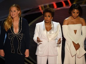 Amy Schumer, Wanda Sykes and Regina Hall speak onstage during the 94th Oscars at the Dolby Theatre in Hollywood, Calif., on March 27, 2022.
