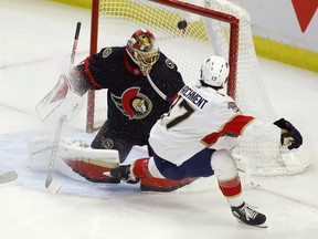 Florida Panthers forward Mason Marchment shots the puck high over Ottawa Senators goaltender Anton Forsberg during the first period on Saturday night at the Canadian Tire Centre.