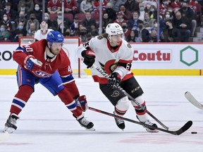 Montreal Canadiens forward Joel Armia (40) takes the puck away from Ottawa Senators forward Tyler Ennis (63) during the third period at the Bell Centre.