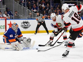 New York Islanders goaltender Semyon Varlamov makes a save against Ottawa Senator Tim Stuetzle during the first period at UBS Arena on Tuesday night.