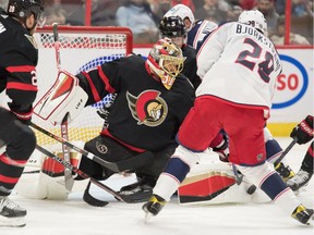 Ottawa Senators goalie Anton Forsberg makes a save on a shot from Columbus Blue Jackets right wing Oliver Bjorkstrand in the first period at the Canadian Tire Centre on Wednesday, March 16, 2022.