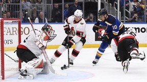 Ottawa Senators defenseman Nick Holden (5) defends the net against St. Louis Blues center Brayden Schenn (10) during the second period at the Enterprise Center.