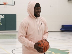 Jesse Luketa plays some basketball at his old high school, St. Pat's in Ottawa.