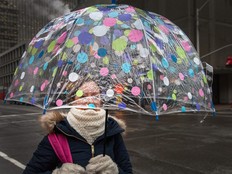 A women under an umbrella.