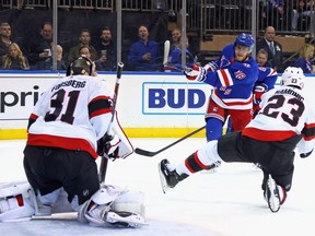 Andrew Copp of the New York Rangers scores his second-period goal against the Ottawa Senators on Saturday.