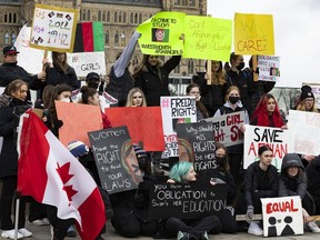 Students from Smiths Falls and District Collegiate Institute protest on Parliament Hill in support of girls in Afghanistan who have been not been allowed to return to school by the Taliban.