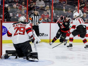 Ottawa Senators defenceman Thomas Chabot (72) fires a shot on New Jersey Devils goaltender Mackenzie Blackwood (29) in the first period.