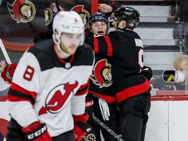 Ottawa Senators left wing Tim Stuetzle (18) celebrates his goal against the New Jersey Devils with teammate Josh Norris (9) in the third period.