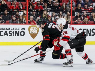 Ottawa Senators left wing Brady Tkachuk (7) breaks away from New Jersey Devils defenceman Damon Severson (28) in the third period.