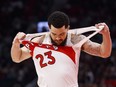 Raptors' Fred VanVleet rips his jersey.