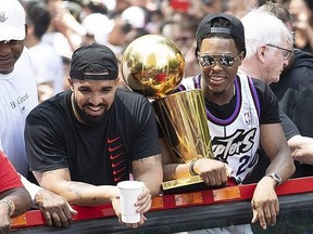 Drake, left, with former Toronto Raptors guard Kyle Lowry during the Toronto Raptors Championship Parade June 17, 2019.