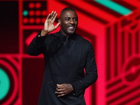 English actor Idris Elba walks on stage during the draw for the 2022 World Cup in Qatar at the Doha Exhibition and Convention Center on Friday, April 1, 2022.
