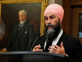 New Democratic Party leader Jagmeet Singh reacts to the 2022-23 budget, outside the House of Commons on Parliament Hill, in Ottawa, April 7, 2022.