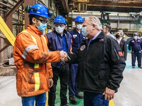 Ontario Premier Doug Ford meets Algoma Steel workers in Sault Ste. Marie on April 8, 2022.