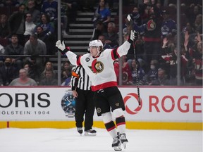 Ottawa Senators' Adam Gaudette celebrates his winning goal against the Vancouver Canucks during a shootout during an NHL hockey game in Vancouver, B.C., Tuesday, April 19, 2022.