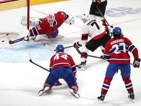 The Ottawa Senators' Brady Tkachuk scores a goal against Montreal Canadiens goaltender Jake Allen during the second period at the Bell Centre on Tuesday night.