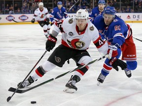 Ottawa Senators left wing Parker Kelly (45) skates with the puck past New York Rangers defenceman Justin Braun (61) during the first period at Madison Square Garden.