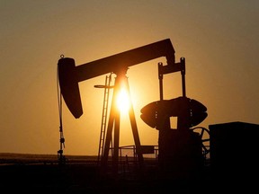 FILE PHOTO: An oil pump jack pumps oil in a field near Calgary.