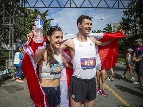 Kinsey Middleton celebrates her marathon finish with Justin Kent at Tamarack Ottawa Race Weekend, Sunday, May 29, 2022.