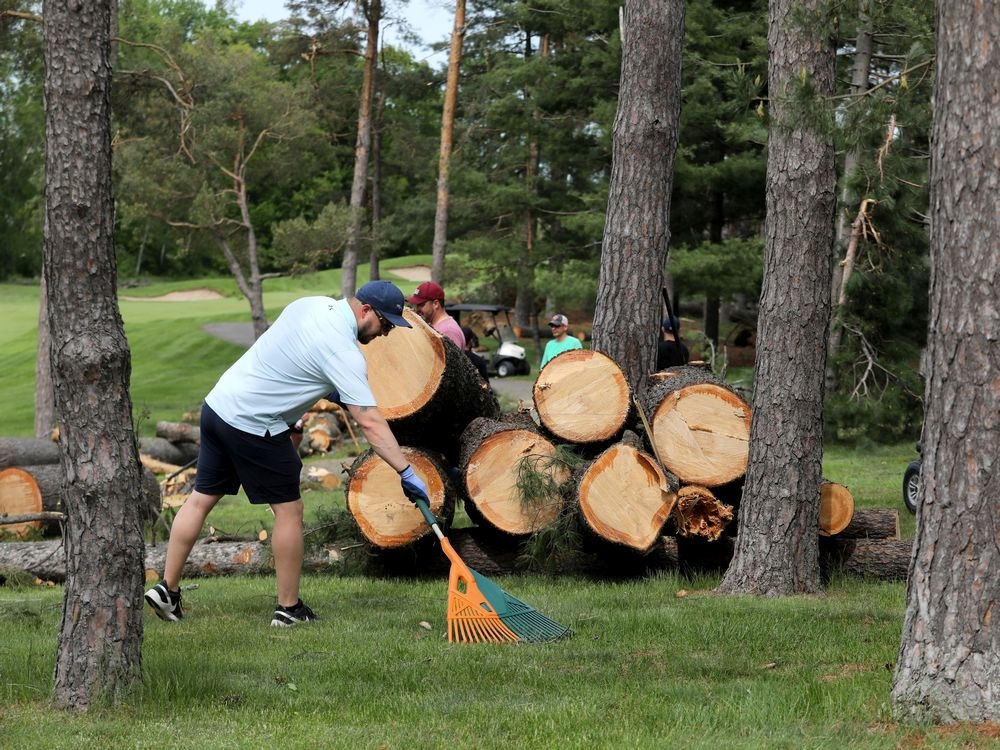Crews are seen cleaning up the  Ottawa Hunt and Golf Club on Wednesday, May 25, 2022.