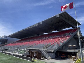 View of the north side stands of TD Place with Civic Centre underneath at Lansdowne Park.